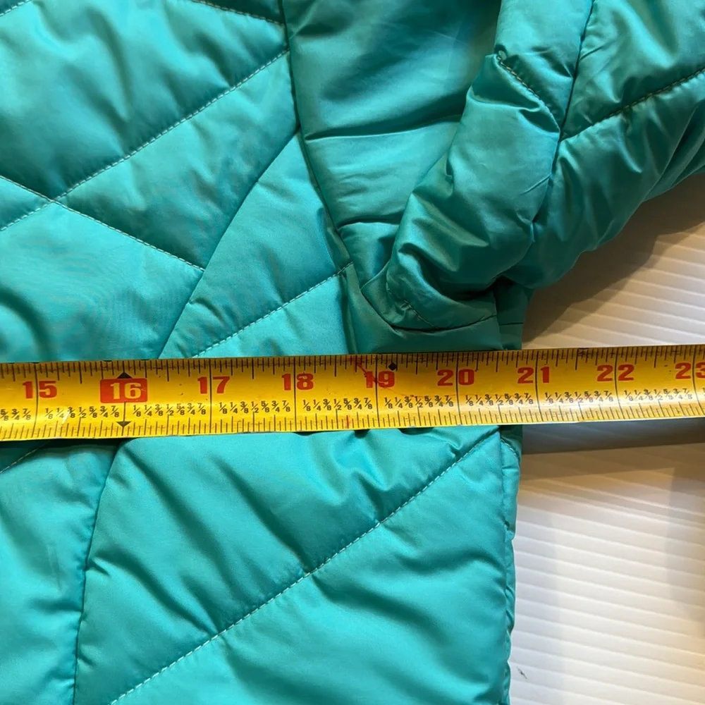 The North Face reversible puffers jacket.  Green, yellow, white swirl. Girls XL